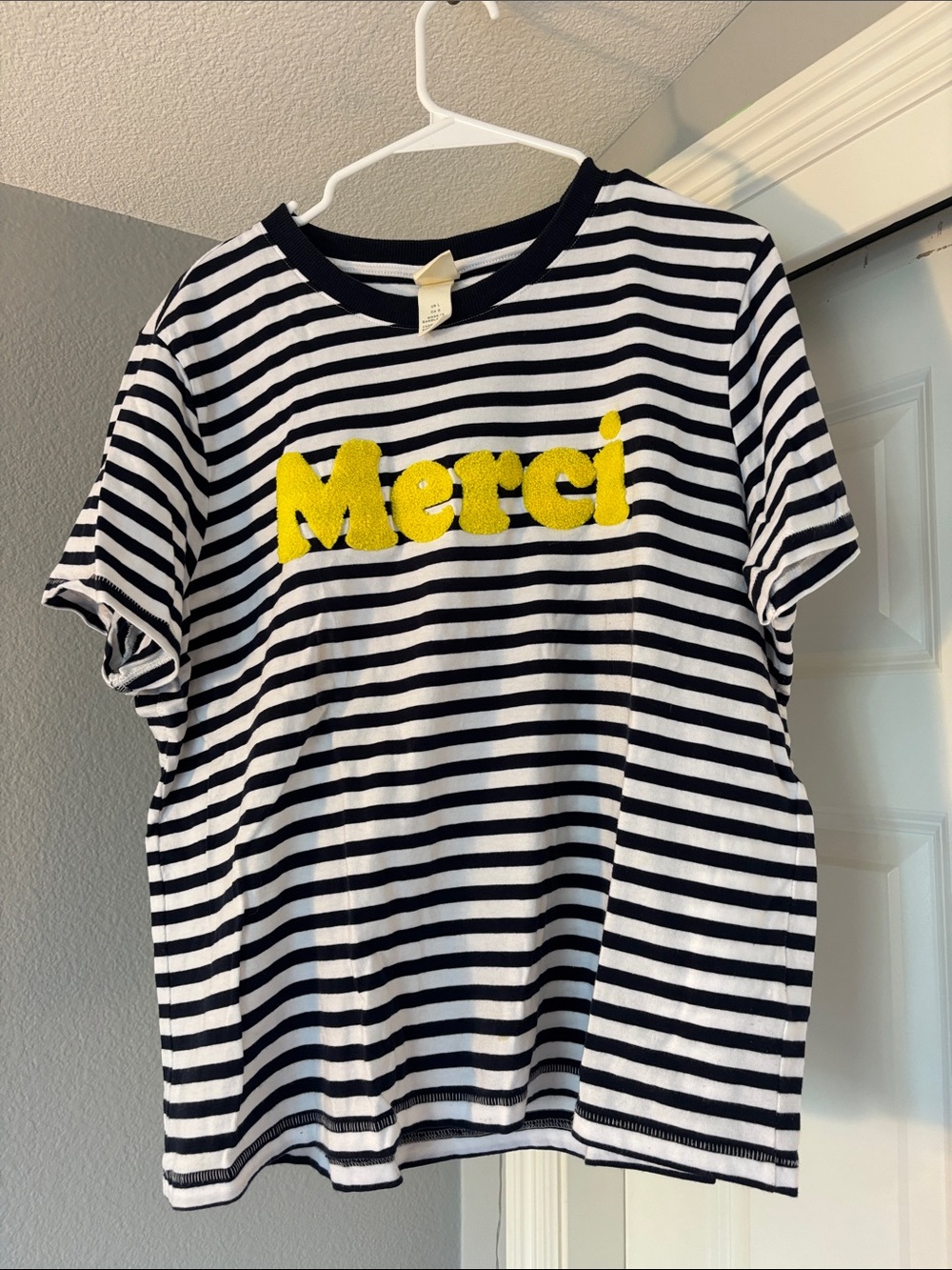 H&M Black & White Striped Tee with Yellow 'Merci' Applique